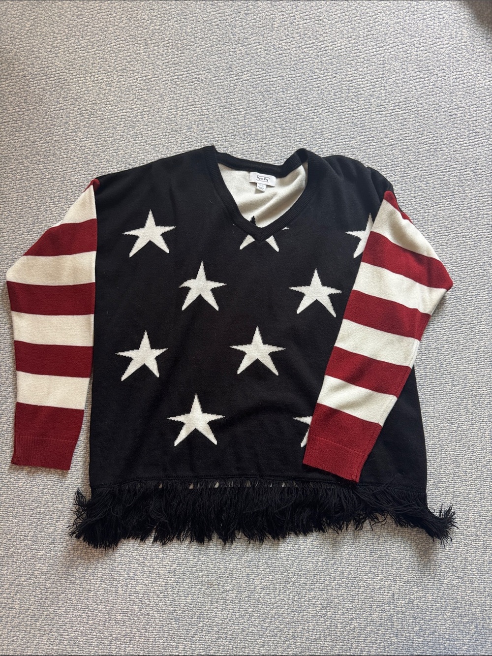 Myra Bag Black V-Neck Sweater with White Stars & Red-White Striped Sleeves
